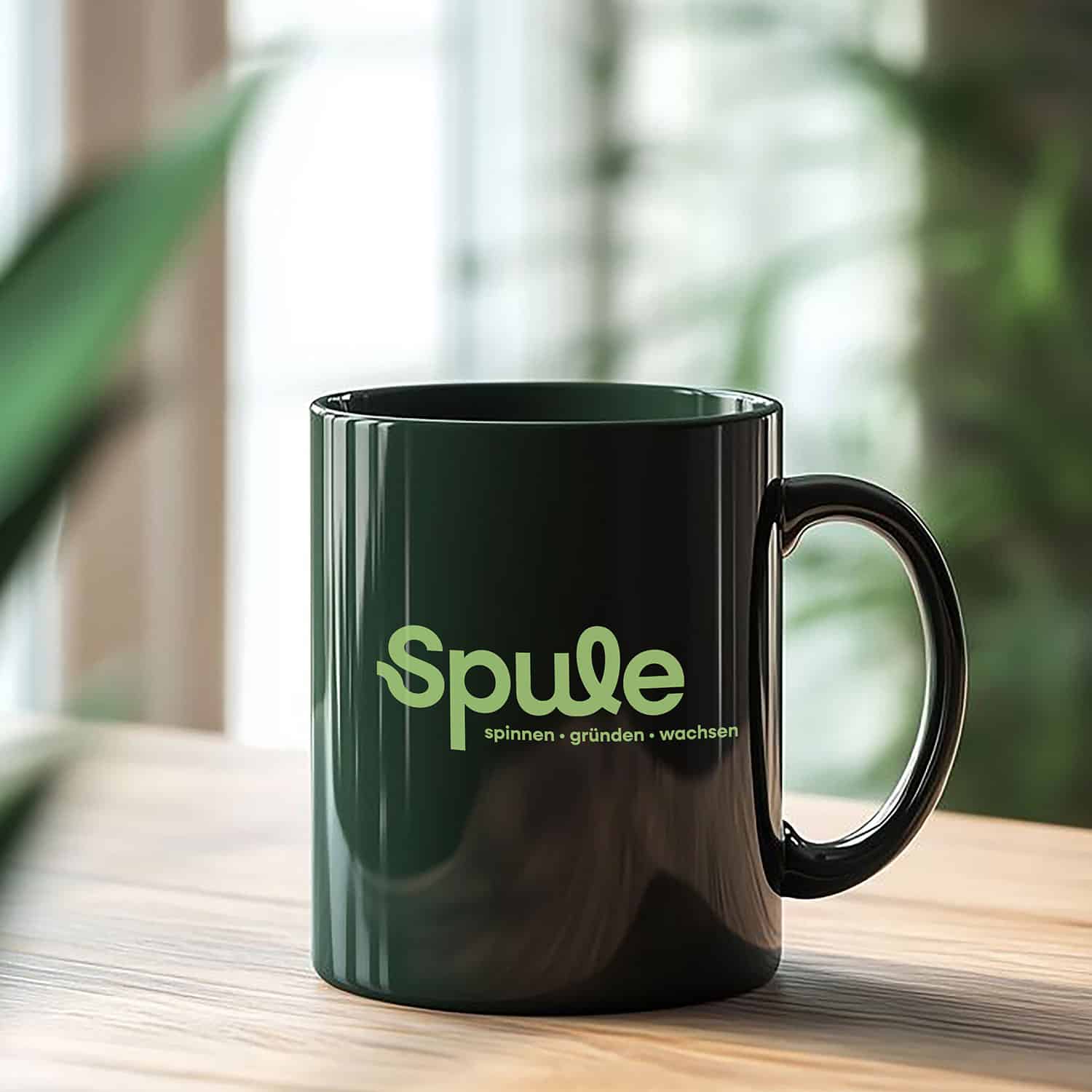 Spule Merchandise Tasse